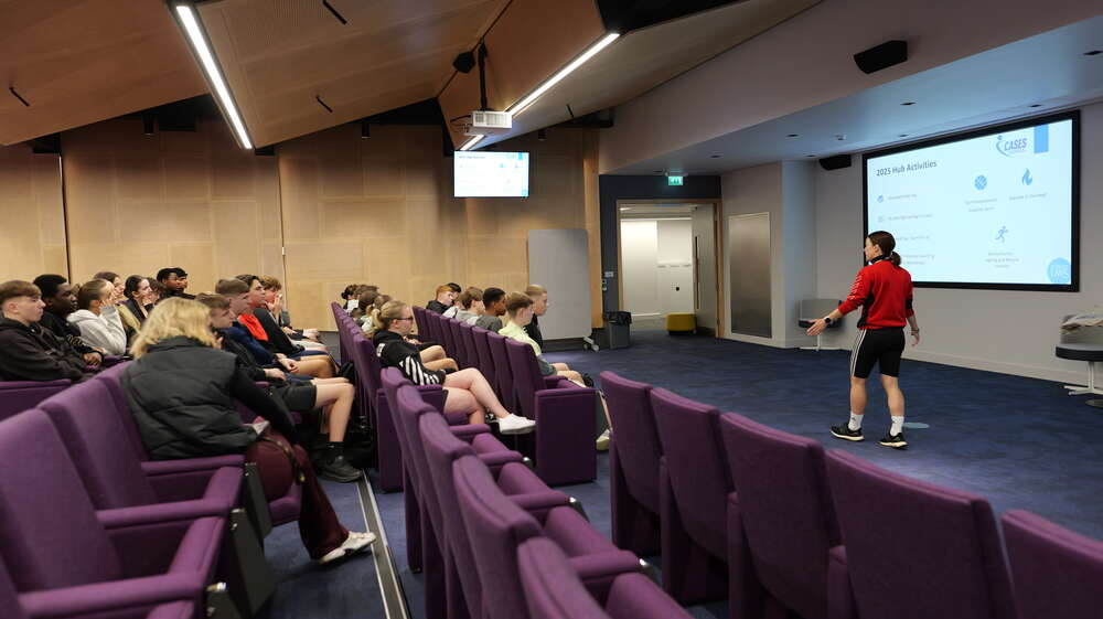 Group of students listening to lecturer